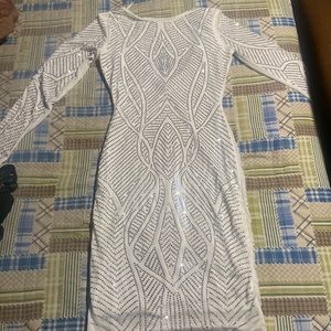 . Was worn once to take pictures and took it off and was washed right after.